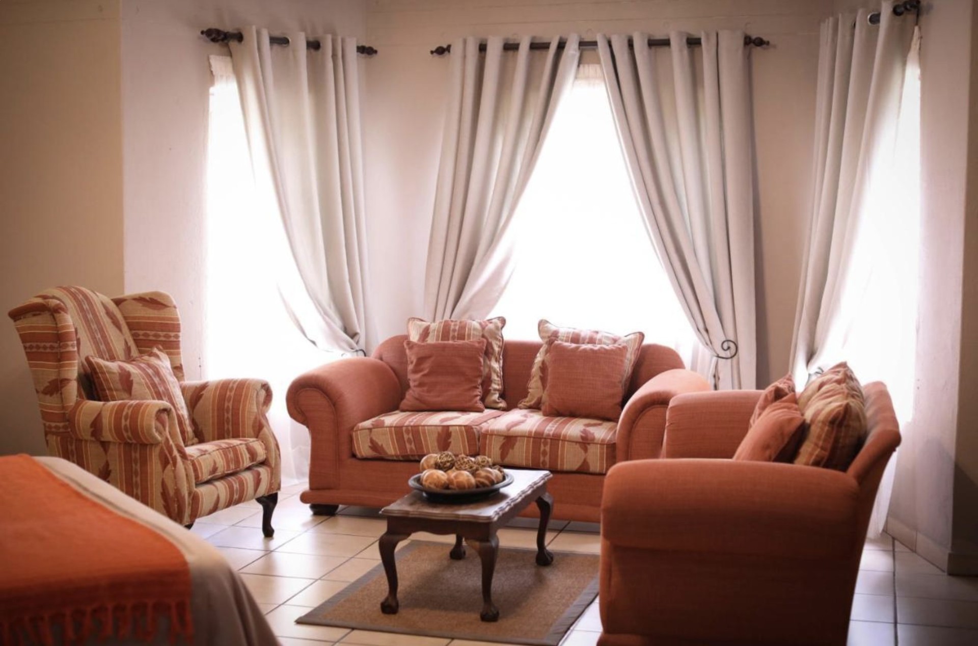 In-room lounge seating at Kokkariba Guest House, Hoedspruit