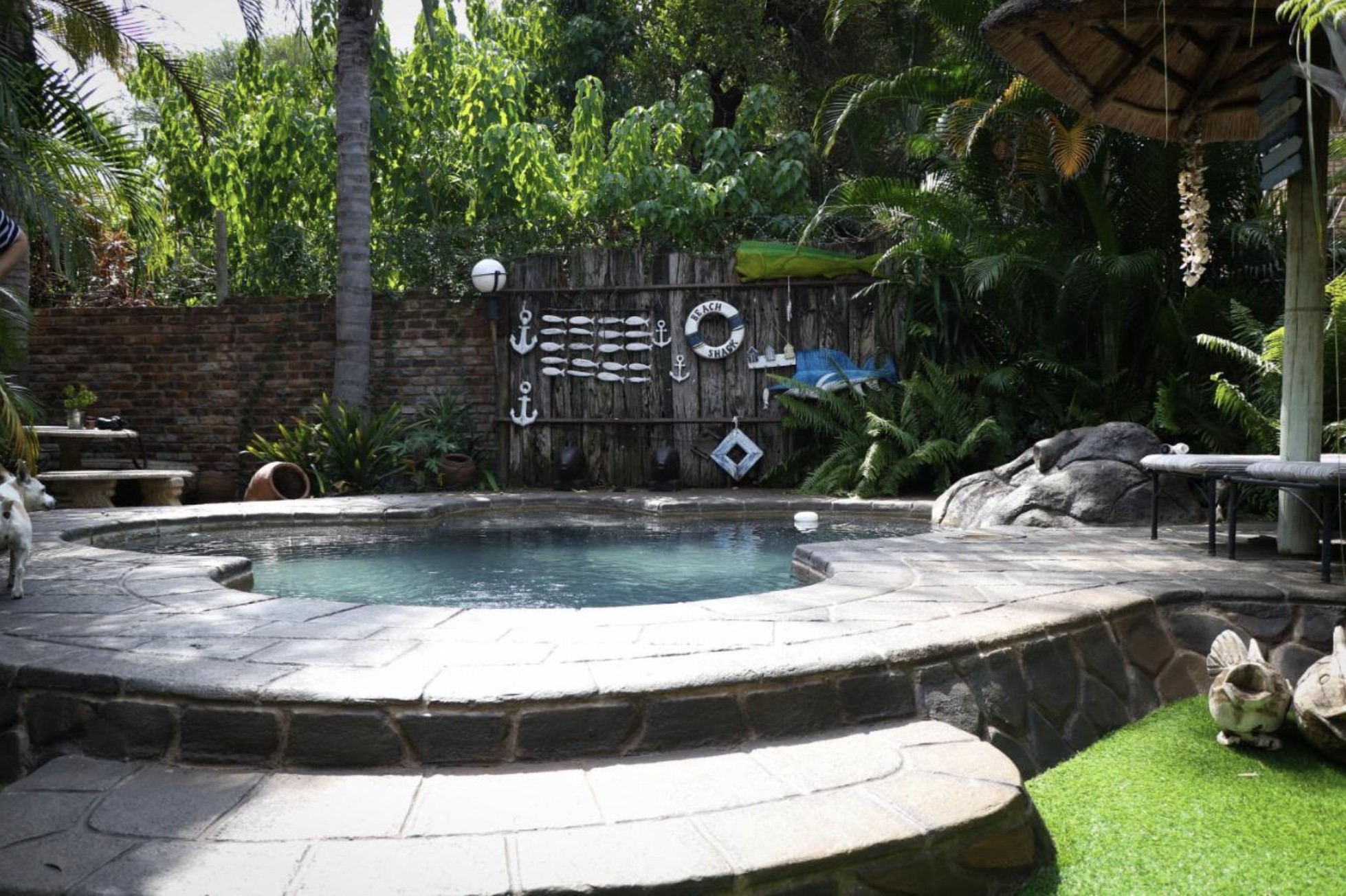 Sparkling garden pool at Kokkariba Guest House