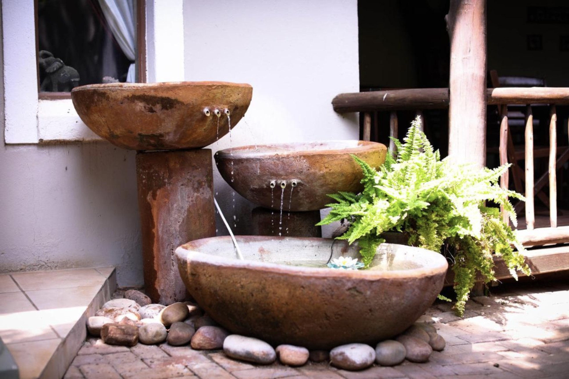 Tiered stone water-bowl feature at Kokkariba Guest House, Hoedspruit